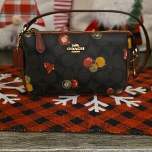 Coach Nolita 19 In Signature Canvas wristlet With Ornament Print